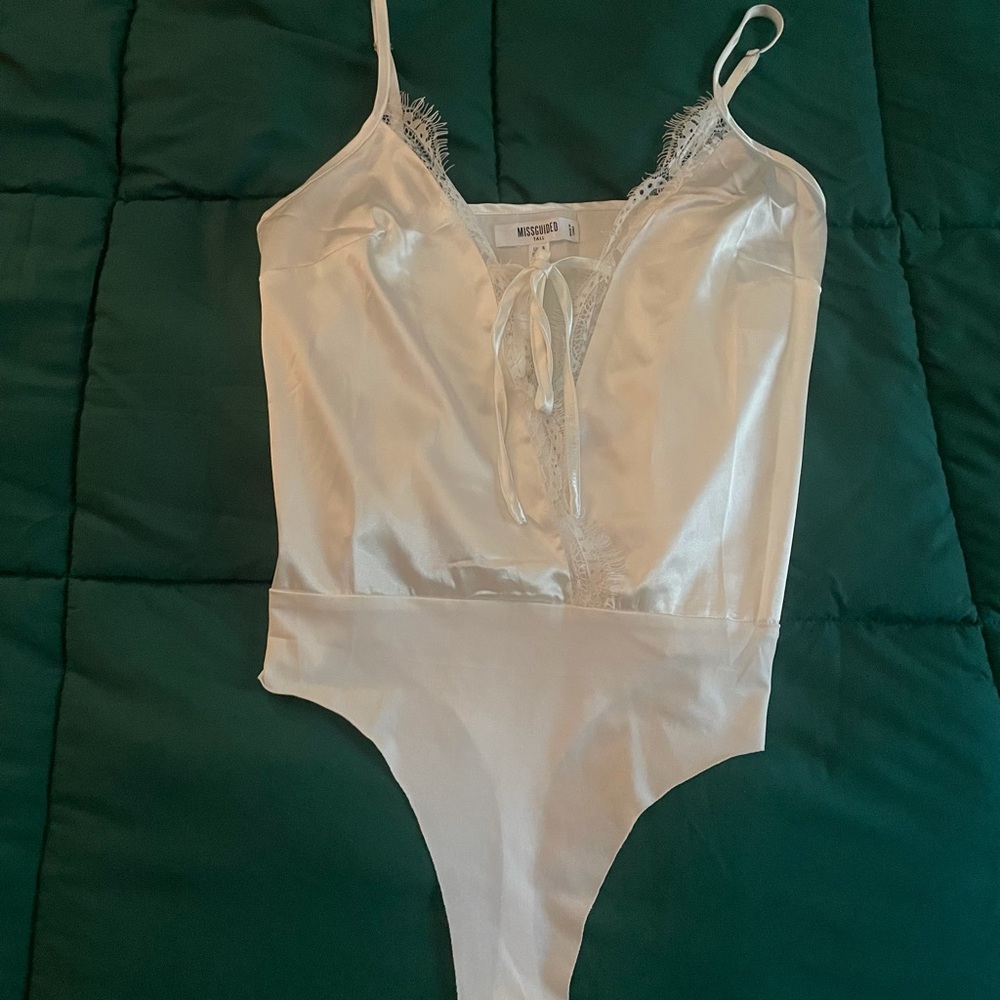 This is a body suit that is 100% polyester.